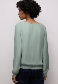 Bluse mit Elastiksaum