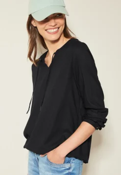 Bluse mit elastischem Saum