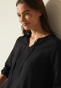Bluse mit elastischem Saum
