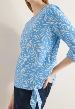 Bluse mit Knoten