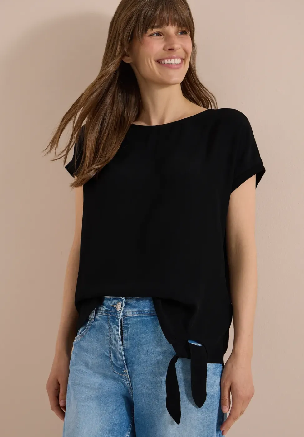 Bluse mit Rundhals und Knotendetail