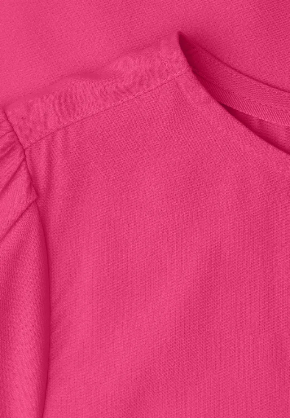 Bluse mit Rundhals und kurzen Puffärmeln