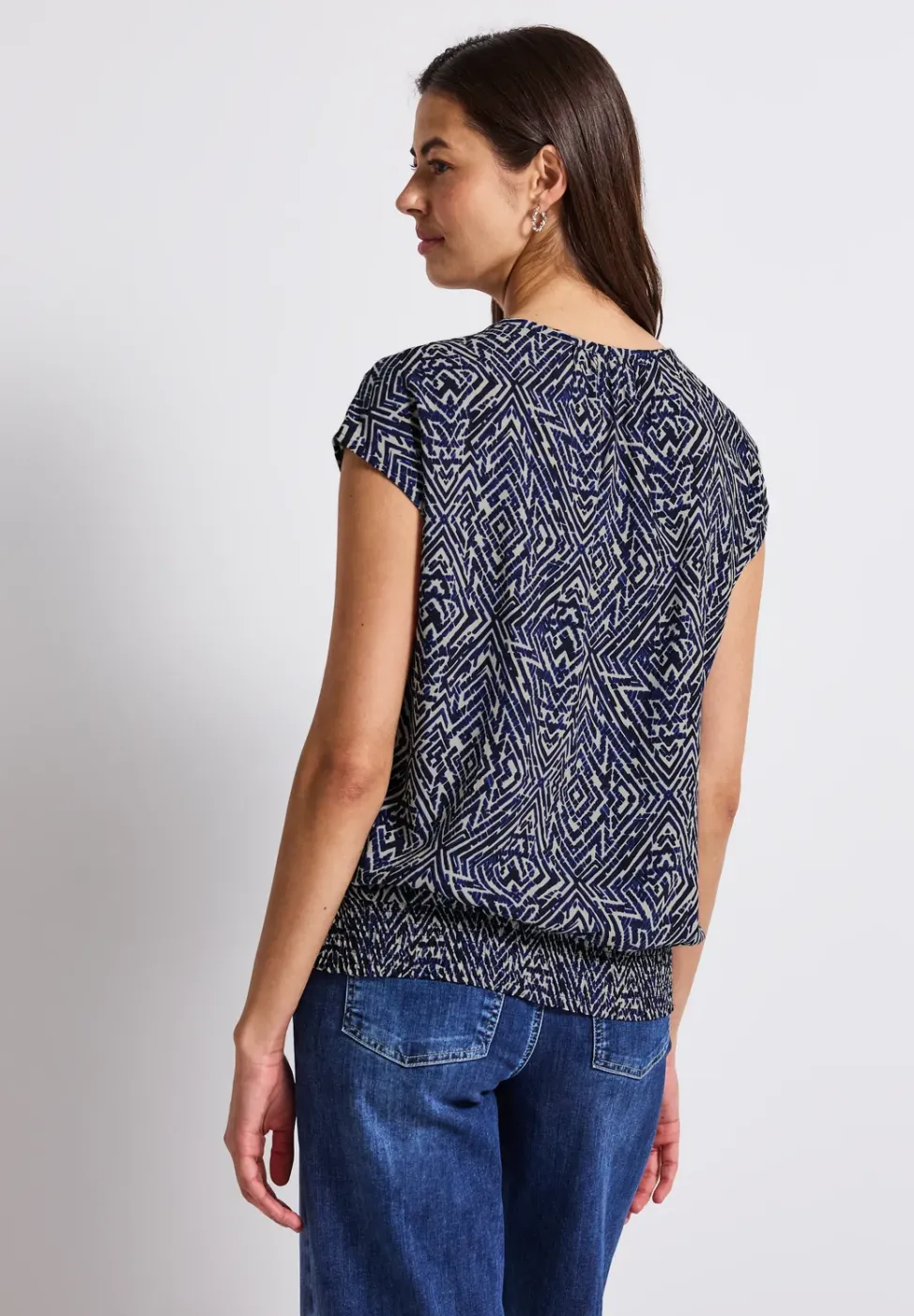 Bluse mit Smoksaum
