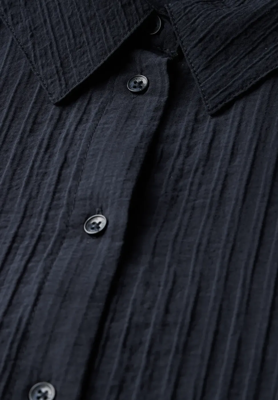 Kurze Strukturbluse