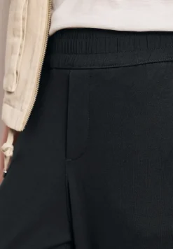 Mid Waist Slim Leg Hose im Loose Fit