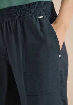 Mid Waist Slim Leg Hose im Loose Fit