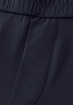 Mid Waist Slim Leg Hose im Loose Fit