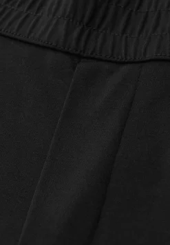 Mid Waist Slim Leg Hose im Loose Fit