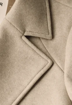 Revers-Mantel