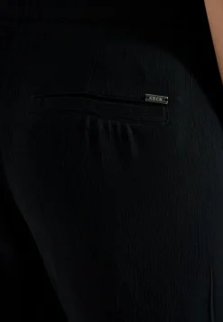 Slim Leg Hose im Loose Fit mit Struktur
