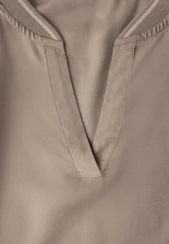Split Neck Bluse mit Tape