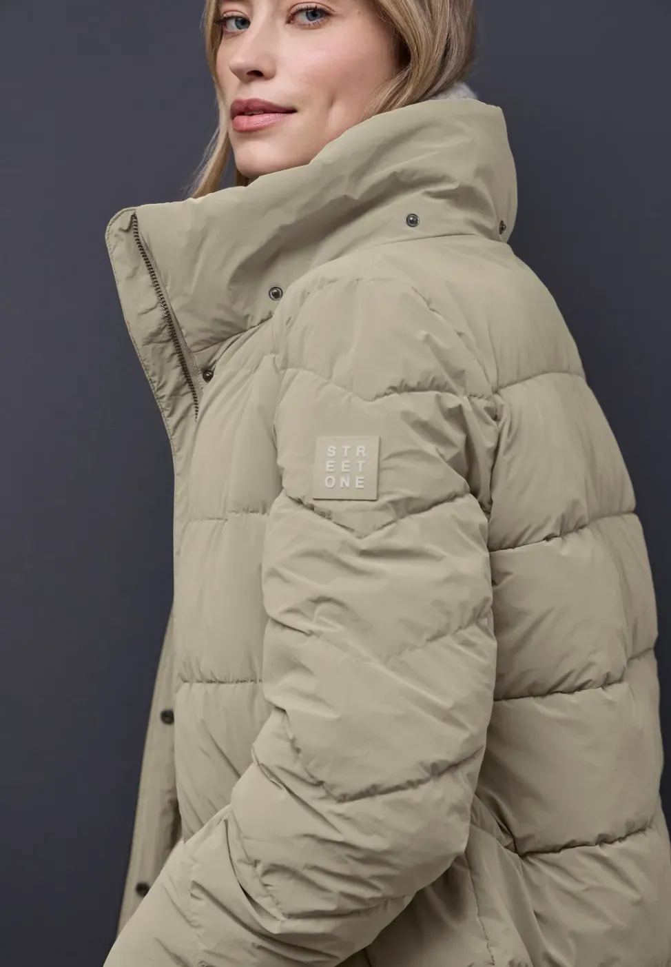 Steppjacke mit Strickdetails