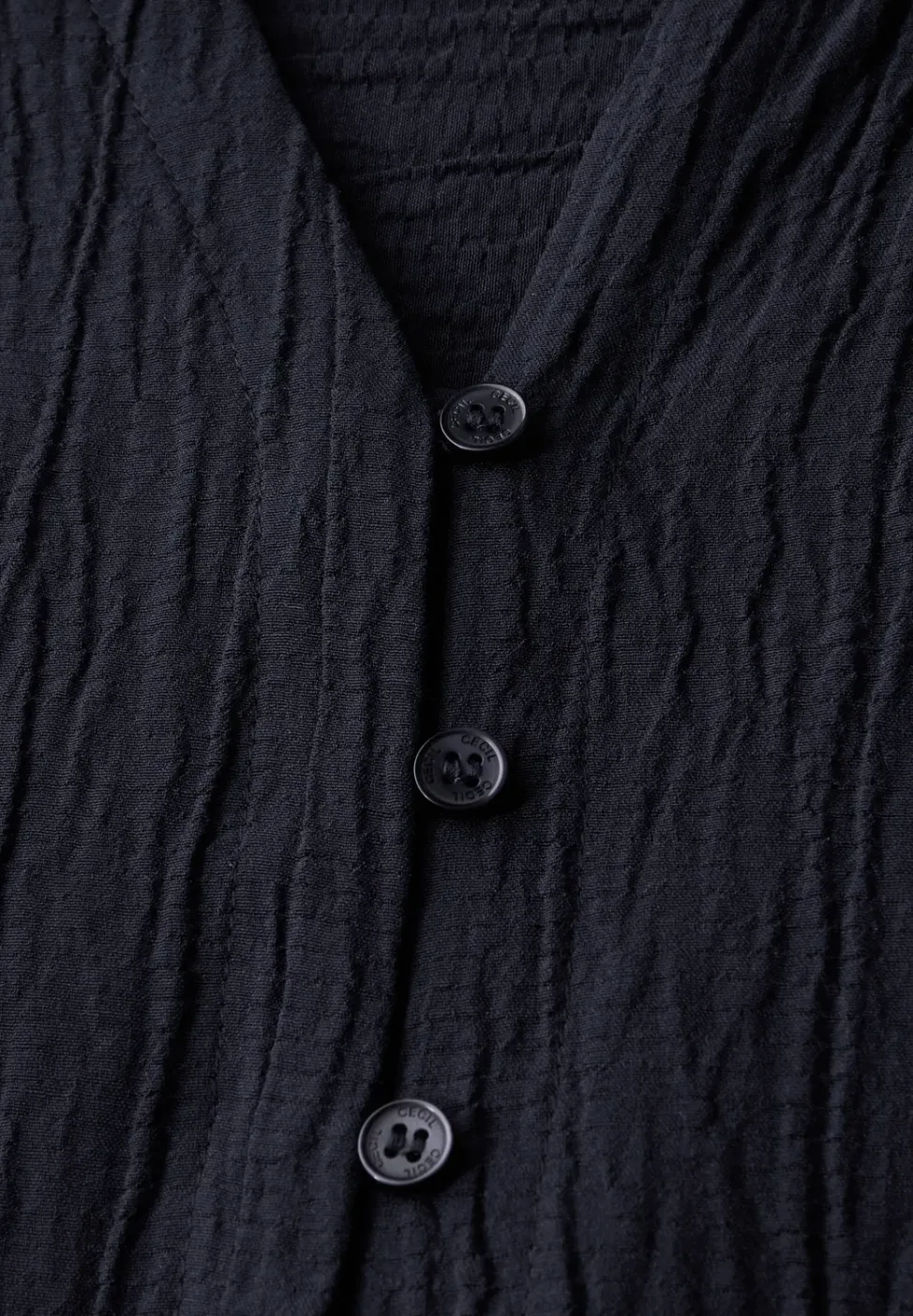 Strukturbluse in Unifarbe