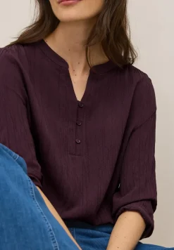 Strukturbluse in Unifarbe