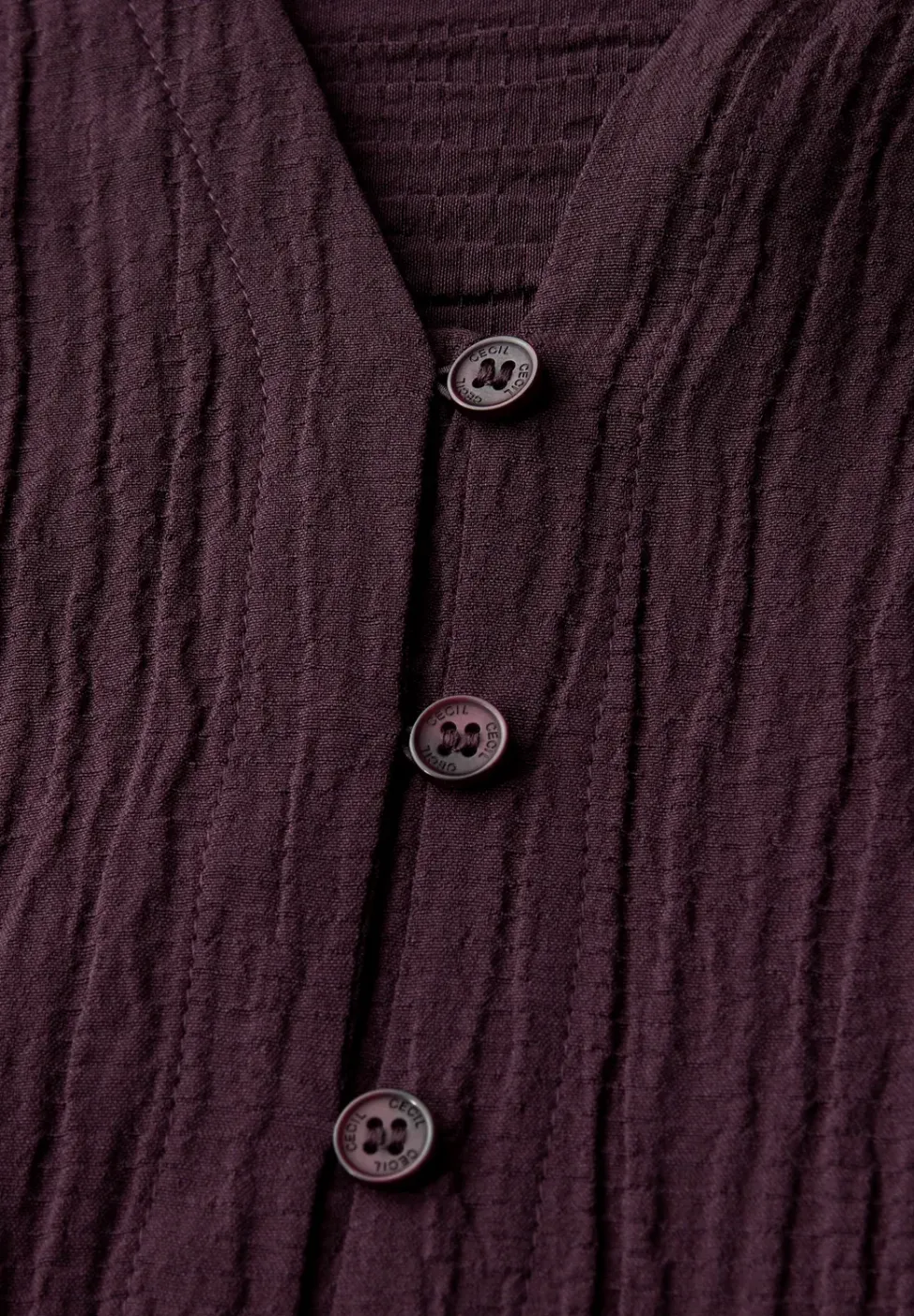 Strukturbluse in Unifarbe
