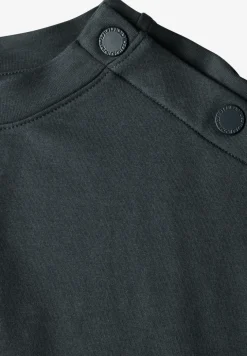 T-Shirt mit Knopfdetail